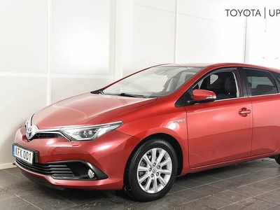 Toyota Auris1,8 Elhybrid Active Plus Comfort Navigation 2015, Halvkombi