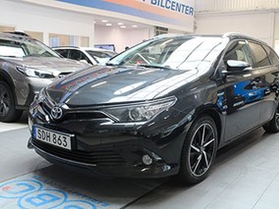 Toyota Auris Touring Hybrid e-CVT Executive / Navi / Skinn